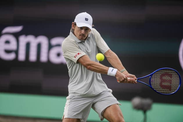 S-HERTOGENBOSCH, NETHERLANDS - JUNE 13: Alex de Minaur of Australia plays a backhand against Adrian Mannarino of France during their ATP, Tennis Herren Singles Semifinal match at the LibÃ ma Open on June 13, 2026 at Autotron s-Hertogenbosch in s-Hertogenbosch, Netherlands. Credit: Andy Astfalck NurPhoto Netherlands Copyright: xAndyxAstfalckx
