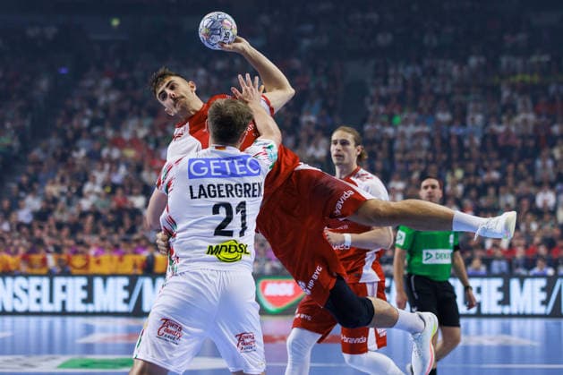 Mads HOXER Aalborg Handbold, 14 scores a goal, Action, Goal throw GER, Aalborg Handbold vs SC Magdeburg, Handball, TruckScout24 EHF FINAL4 2026, Match for 3rd place, Match time 2025 2026, 14 06 2026,, GER, Aalborg Handbold vs SC Magdeburg, Handball, TruckScout24 EHF FINAL4 2026, Match for 3rd place, Match time 2025 2026, 14 06 2026, Koeln Copyright: xEibnerxPressefoto OliverxSchmidtx EP_OST