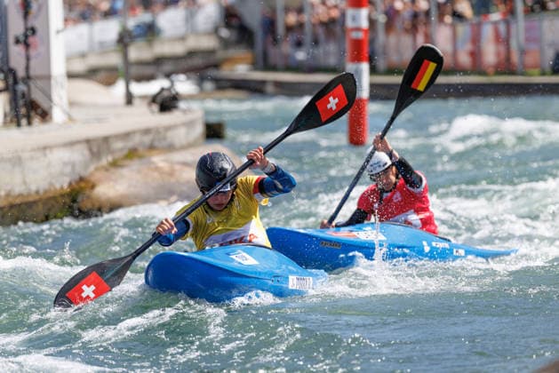 Tereza Kneblova CZE , Evy Leibfarth USA , Alena Marx SUI , Ricarda Funk GER at ICF CANOE SLALOM WORLD CUP, Canoeing, Women, Kayak Cross, 2026, on 14 06 2026 in Augsburg, Eiskanal Bayern Germany