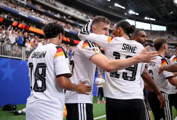 Soccer FIFA World Cup 2026 preliminary round group E in Houston Germany Curacao 14 06 2026 Germany celebrating after the goal to 2 1, from left, goal scorer Nico Schlotterbeck with Leroy Sane