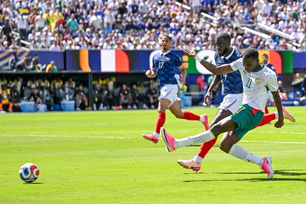 Dayot Upamecano of France and Nicolas Jackson of Senegal battle for the ball during the 2026 FIFA World Cup Group I match between France and Senegal at New York New Jersey Stadium on June 16, 2026, in East Rutherford, United States. Photo by Harry Langer, DeFodi Images,detected_source_language