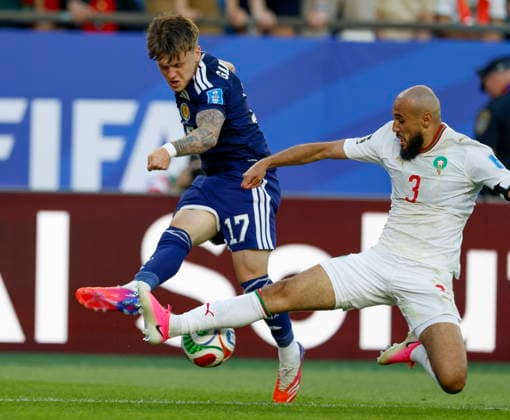FIFA World Cup, WM, Weltmeisterschaft, Fussball 2026 - Group C - Scotland vs Morocco epaselect Morocco defender Noussair Mazraoui (R) blocks a kick by Scotland midfielder Ben Gannock-Doak (L) during the FIFA World Cup 2026 group stage match between Scotland and Morocco at Boston Stadium in Foxborough, Massachusetts, USA, 19 June 2026. FOXBOROUGH United States  Copyright: xGREGxM.xCOOPERx