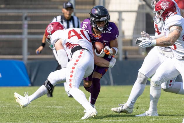 EFA European Football Alliance Frankfurt Galaxy vs. Prague Lions, June 21, 2026. Tomas Pazourek of the Prague Lions makes a tackle on Ahsan Moore of the Frankfurt Galaxy (No. 14) with the ball, Frankfurt Galaxy vs. Prague Lions, Frankfurt, PSD Bank Arena, June 21, 2026,detected_source_language Copyright: xBEAUTIFULxSPORTS Gawlikx