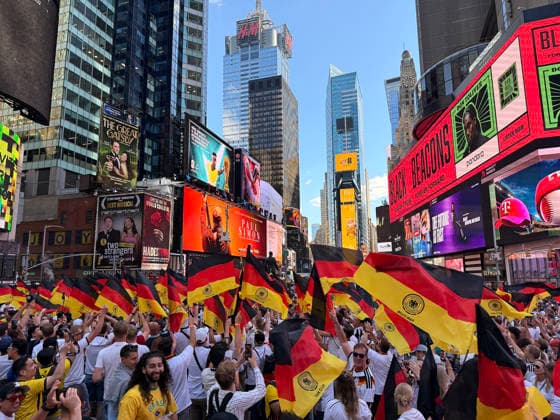 German fans celebrate peacefully on the eve of the match against Ecuador in Times Square, New York, June 24, 2026. Times Square fan gathering ahead of Germany vs. Ecuador