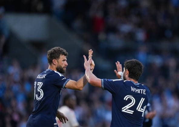 July 8, 2026, Burnaby, Bc, CANADA: Vancouver Whitecaps Thomas Muller (13) and Brian White (24) celebrate Muller s goal during the second half of a Canadian Championship quarterfinal soccer match against Cavalry FC, in Burnaby, B.C., on Wednesday, July 8, 2026. Canada News - July 8, 2026 - ZUMAc35_ 20260708_zaf_c35_086 Copyright: xDarrylxDyckx