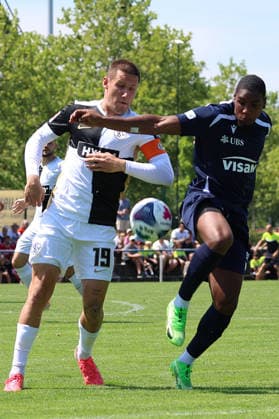 July 11, 2026, xrekx, Soccer Friendly Match, SV Elversberg vs. FC Thun, Lukas Pinckert, SV 07 Elversberg, Brighton Labeau, FC Thun, tackle, action, battle for the ball. DFL and DFB regulations prohibit any use of photographs as image sequences and or quasi-video. Rust