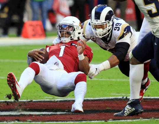 USA AMERICAN FOOTBALL NFL, American Football Herren, USA Los Angeles Rams at Arizona Cardinals epa08038471 Arizona Cardinals quarterback Kyler Murray (L) is sacked by Los Angeles Rams defensive tackle Aaron Donald (R) during the NFL American Football game between the Los Angeles Rams and the Arizona Cardinals in Glendale, Arizona, USA, 01 December 2019. GLENDALE United States  Copyright: xROYxDABNERx