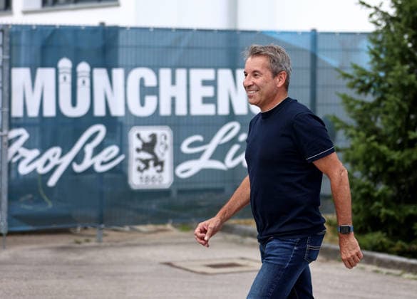 Soccer, Men s, Bavarian Regional League, 2026–2027 Season, TSV 1860 Munich, Training: Gernot Mang, President of TSV 1860 Munich, walking in front of the sign reading Munich’s Great Love and the club crest