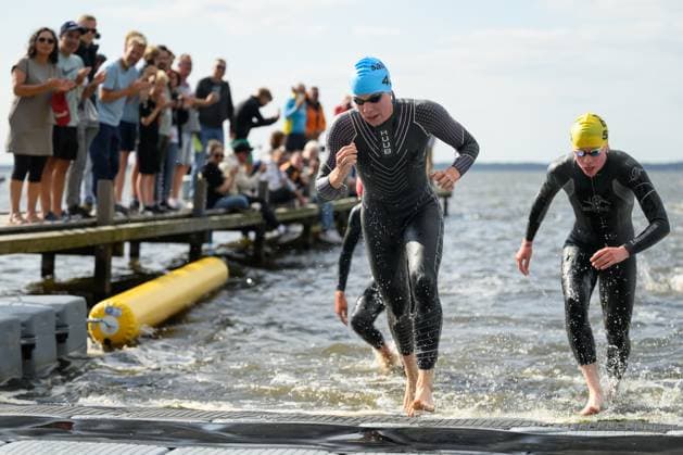 DTU German Mixed Relay Championships as part of Die Finals Hannover: Laura Lindemann of Triathlon Potsdam transitions from swimming to cycling at the DTU German Mixed Relay Championships as part of Die Finals Hannover, July 23, 2026. COPYRIGHT Petko Beier petkobeier.de, Steinhuder Meer, Germany