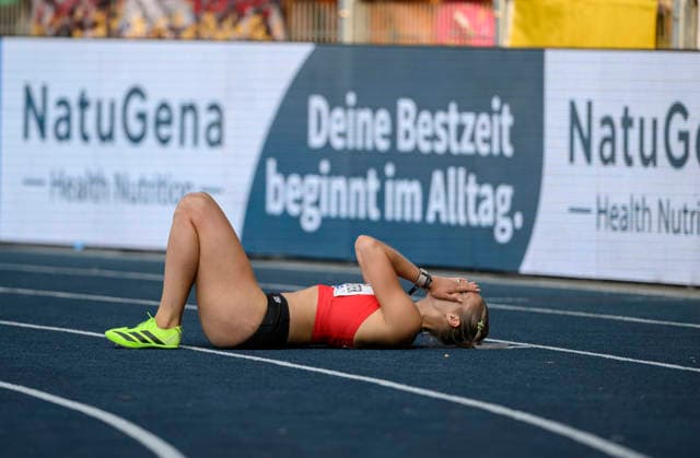 Celebrating the winner, Franziska SCHUSTER, in the 100-meter hurdles final on July 25, 2026, at the German Track and Field Championships held from July 25 to July 26, 2026, in Bochum-Wattenscheid, Germany, at Lohrheidestadion