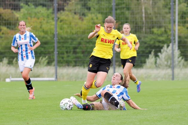 July 26, 2026, xgrfx, Women s Soccer Friendly Match, Borussia Dortmund vs. SC Heerenveen, Lena Ostermeier (Borussia Dortmund), Romaissa Boukakar (SC Heerenveen). DFL and DFB regulations prohibit any use of photographs as image sequences and or quasi-video. Hohenbuschei Training Facility