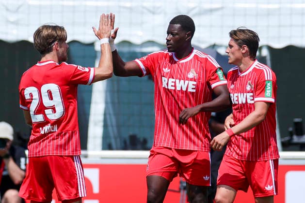 Ragnar Prince Friedel Ache of 1. FC Köln celebrates his goal to make it 1–0 with Jan Thielmann of 1. FC Köln and Alessio Castro Montes of 1. FC Köln, Friendly match, 1. FC Köln vs. Hertha BSC Berlin, Koasastadion on July 31, 2026, in St. Johann in Tirol, Austria. Photo by Marco Steinbrenner, DeFodi Images. Ragnar Prince Friedel Ache of 1. FC Köln celebrates after scoring his team’s first goal with Jan Thielmann of 1. FC Köln and Alessio Castro Montes of 1. FC Köln, Friendly match, 1. FC Köln vs. Hertha BSC Berlin, Koasastadion, July 31, 2026, in St. Johann in Tirol, Austria. Photo by Marco Steinbrenner, DeFodi Images