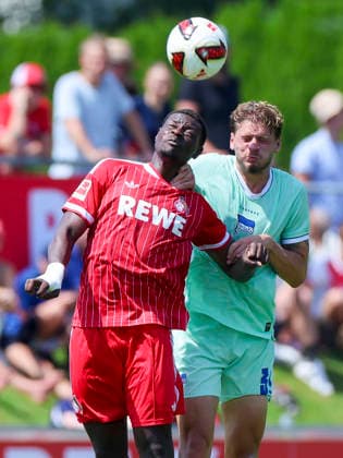Ragnar Prince Friedel Ache of 1 FC Köln and Marton Dardai of Hertha BSC Berlin battle for the ball, Friendly match, 1 FC Köln vs. Hertha BSC Berlin, Koasa Stadium on July 31, 2026, in St. Johann in Tirol, Austria. Photo by Marco Steinbrenner, DeFodi Images. Ragnar Prince Friedel Ache of 1. FC Köln and Marton Dardai of Hertha BSC Berlin battle for the ball, Friendly match, 1 FC Köln vs. Hertha BSC Berlin, Koasastadion, July 31, 2026, in St. Johann in Tirol, Austria. Photo by Marco Steinbrenner, DeFodi Images