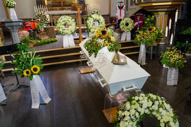 Funeral for rower Olaf Tufte, Horten, July 31, 2026. Flowers and wreaths near the casket of Norway’s Olympic and World rowing champion Olaf Tufte before his funeral service at Horten Church. Tufte died of a heart attack on July 21, at the age of 50. He retired after the Tokyo Olympics in 2021, bringing to a close an elite international career spanning 26 seasons. Photo: Terje Bendiksby, NTB POOL, Horten, Norway. EDITORIAL USE ONLY. RESTRICTED USE FOR BETTING COMPANIES.  Copyright: xTerjexBendiksbyx xNTBx