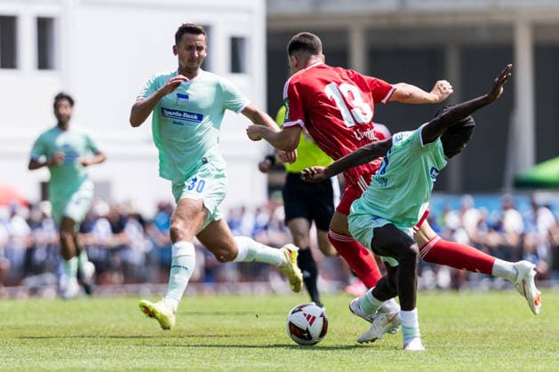 ST. JOHANN IN TIROL, AUSTRIA - JULY 31: Said El Mala (1. FC Koeln, 13) controls the ball against Boris Mamuzah Lum (Hertha BSC Berlin, 21) - foul - during a friendly game between 1. FC Koeln vs. Hertha BSC Berlin at trainings camp of 1. FC Koeln in Kitzbuehel of season 2026 27 at Koasastadion on July 31, 2026 in St. Johann in Tirol, Austria. Austria Copyright: xSteffiexWunderlx