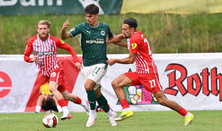 July 31, 2026 Soccer Season 2026–2027 Exhibition Match Friendly Match Preseason Match SC Freiburg vs. SpVgg Greuther Fürth Kleeblatt Sports Photo by Zink xwoxzix; regulations prohibit any use of photographs as image sequences and or quasi-video; for editorial use only. Aaron Keller 11, SpVgg Greuther Fürth vs. Niklas Beste 19, SC Freiburg; on the left, Berkay Yilmaz 27, SC Freiburg; on the right