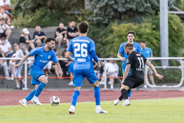 VfB Friedrichshafen vs. SSV Ulm 1846 Soccer, WfV Cup, 2nd Round, Zeppelinstadion Friedrichshafen, July 29, 2026, v. l. Erbas Emirhan, VfB Friedrichshafen, 25, Dennis Chessa, SSV Ulm 1846, Soccer, 11 VfB Friedrichshafen vs. SSV Ulm 1846, Soccer, WfV Cup, Round 2, Zeppelinstadion Friedrichshafen, July 29, 2026. Photo by Lucca Fundel, Friedrichshafen Zeppelinstadion, Baden-Württemberg, Germany