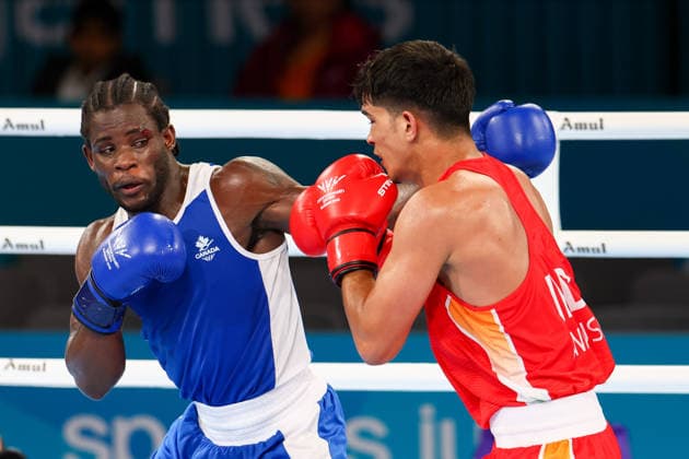RECORD DATE NOT STATED 31st July 2026; Glasgow, Scotland; 2026 Commonwealth Games, Day Nine; Mens 80kg Boxing Semi Finals, Ankush Ankush (IND) in red against Joshua Ofori (CAN) in blue RogerxEvans