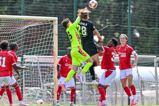 260731 Standard de Liege vs Arminia Bielefeld Belmin Dizdarevic (35) of Standard CL and Roberts Uldrikis (28) of Arminia Bielefeld during a friendly soccer game in the preparations ahead of the Jupiler Pro League season 2026 - 2027 between Standard de Liege and Arminia Bielefeld from Germany on July 31 , 2026 in Liege, Belgium. (Photo by Stijn Audooren Isosport) Liege SL16 Football Campus Liege Belgium  Copyright: xIsosportxStijnxAudoorenx