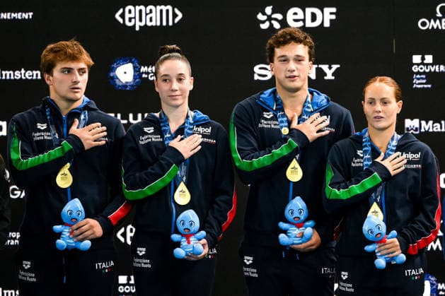 Chiara Pellacani, Matteo Santoro, Sarah Jodoin Di Maria, Raffaele Pelligra of Italy attend the medal ceremony of the diving Team Event Mixed Final with gold medal during the European Aquatics Championships at the Olympic Aquatic Center in Paris (France), July 31, 2026. Andrea Staccioli