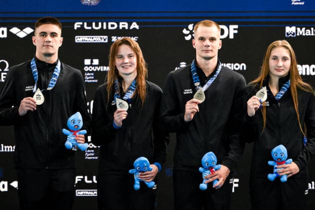 Nadezhda Trifonova, Grigorii Ivanov, Ekaterina Beliaeva, Ruslan Ternovoi Neutral Athlete B show the silver medal after competing in the diving Team Event Mixed Final during the European Aquatics Championships at the Olympic Aquatic Center in Paris (France), July 31, 2026. Andrea Staccioli