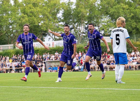 Soccer, Men s, 2026–2027 Season, Regionalliga Northeast, Matchday 2, SV Tasmania Berlin vs. FC Erzgebirge Aue; from left: Simon Skarlatidis (Aue), Patrick Kapp (Aue), Stylianos Kokovas (Aue), Rintaro Yajima (Tasmania), Celebration after the 0–1 goal, July 31, 2026, Copyright: xSebastianxRäppold MatthiasxKochx