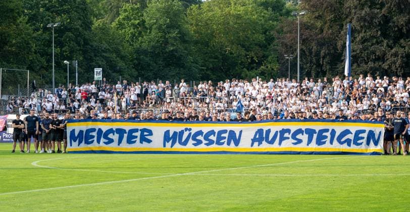 Soccer, Men s, 2026–2027 Season, Regionalliga Northeast, Matchday 2, SV Babelsberg 03 vs. FC Carl Zeiss Jena; Jena fans pictured, and Babelsberg fans demonstrated before the game in support of a promotion reform for the Regionalligas—champions must be promoted, Kompass model now, July 31, 2026, Copyright: xMatthiasxKochx