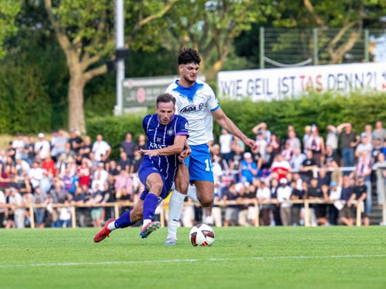 Soccer, Men s, 2026–2027 Season, Regionalliga Nordost, Matchday 2, SV Tasmania Berlin vs. FC Erzgebirge Aue, from left: Simon Skarlatidis (Aue), Fatih Baca (Tasmania), July 31, 2026, Copyright: xSebastianxRäppold MatthiasxKochx