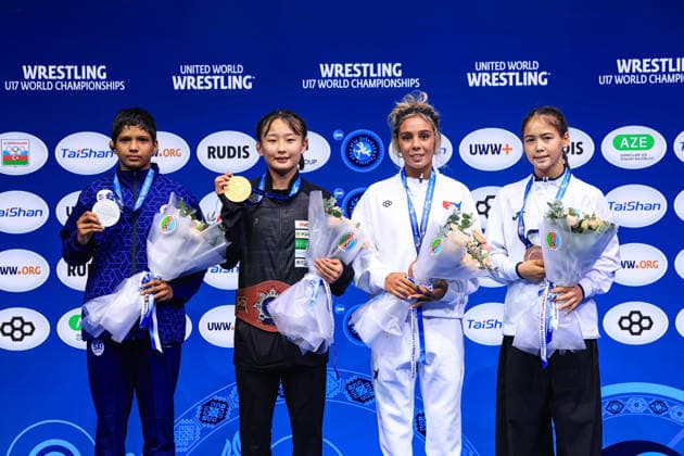 U17 Wrestling World Championships Podium: 46kg WW – Gold: Kokona Makino (JPN); Silver: Sandhya Vishnoi (IND); Bronze: Madison Marie Healey (USA); Inzhu Bakkozha (KAZ) Copyright: xUnitedxWorldxWrestlingx xAmirrezx UWW-U17-WC-BAKU-2026