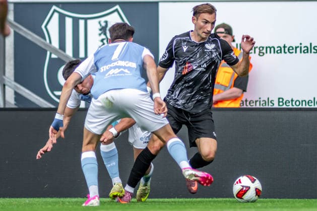 Chemnitz, Germany, July 31, 2026; Northeast Regional League 2026–2027, Matchday 2: Chemnitzer FC vs. BFC Preussen. Pictured, from left, in a tackle: Tobias Stockinger (CFC) and Luca Butkovic (BFC). Copyright: xFotostandx xNachtigallx