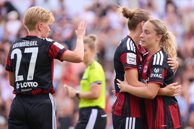Bad Nauheim, Germany, July 31, 2026, Friendly Match: Eintracht Frankfurt Women vs. Racing Club de Strasbourg. Pictured from left: Third goal scorer Danique Tolhoek (SGE) scores the 1–0 goal for Frankfurt and celebrates with Paulina Krumbiegel (SGE) and Marthine Östenstad (SGE). Copyright: HMBxMedia MadeleinexFantini