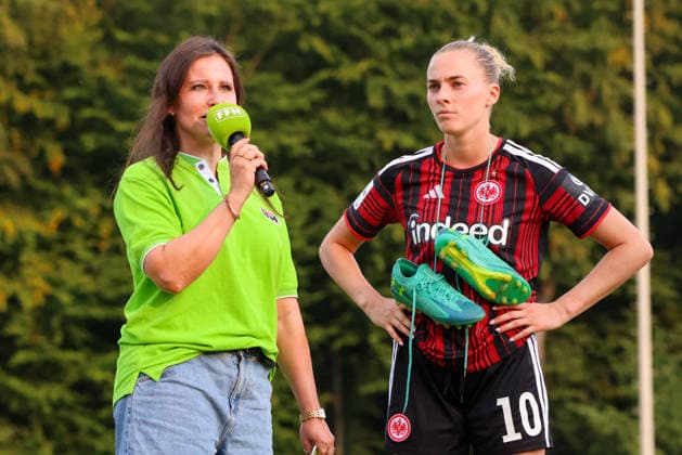 Bad Nauheim, Germany, July 31, 2026: Friendly match between Eintracht Frankfurt Women and Racing Club de Strasbourg. Pictured, from left: Laura Freigang, second from left, of SGE, in an FFH interview after the victory over Racing Strasbourg. Copyright: HMBxMedia MadeleinexFantini