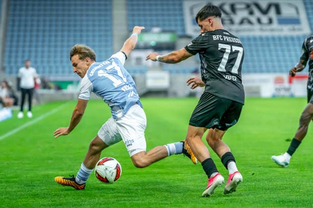 Chemnitz, Germany, July 31, 2026; Northeast Regional League 2026–2027, Matchday 2: Chemnitzer FC vs. BFC Preussen. Pictured, from left, in a tackle: Maximilian Fesser (CFC) and Ben Meyer (BFC). Copyright: xFotostandx xNachtigallx