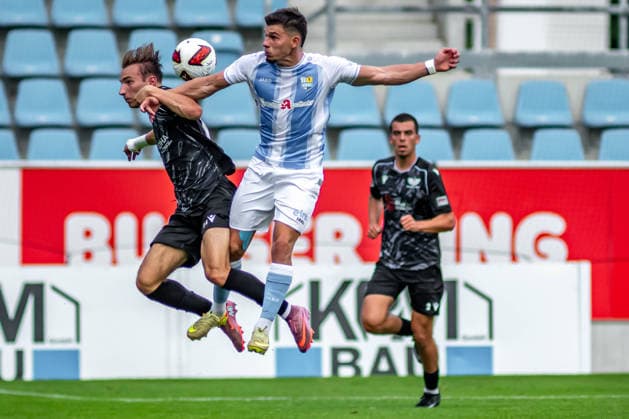 Chemnitz, Germany, July 31, 2026; Northeast Regional League 2026–2027, Matchday 2: Chemnitzer FC vs. BFC Preussen. Pictured, from left, in a tackle: Luca Butkovic (BFC) and Maurizio Grimaldi (CFC) Copyright: xFotostandx xNachtigallx