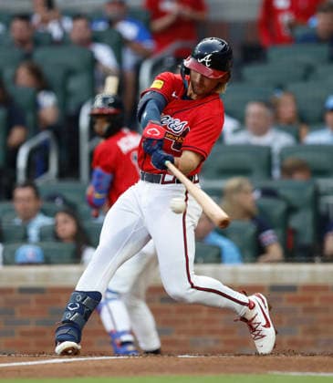 Shortstop Jim Jarvis 74 of the Atlanta Braves hits an RBI single in the second inning against the Washington Nationals at Truist Park on Friday, July 31, 2026 in Atlanta, Georgia.  ATL20260731107 MikexZarrilli