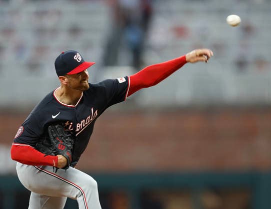 Pitcher Foster Griffin 22 of the Washington Nationals throws a pitch in the fifth inning against the Atlanta Braves at Truist Park on Friday, July 31, 2026 in Atlanta, Georgia.  ATL20260731113 MikexZarrilli