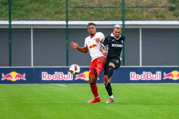 Benjamin Henrichs, RB Leipzig, 39, tackle, duel, battle for the ball; Niko Kijewski, SC Verl, 19, RB Leipzig vs. SC Verl, soccer, friendly match, 2026–27 season, August 1, 2026, RB Leipzig vs. SC Verl, soccer, friendly match, 2026–27 season, August 1, 2026, Leipzig Copyright: xEibner-Pressefoto LauraxRoemerx EP_LRR