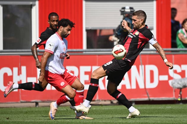Robert ANDRICH LEV vs. Ekin CELEBI RWE Action, Tackle, Soccer, Bundesliga 1, Friendly Match, Bayer Leverkusen (LEV) vs. Rot-Weiss Essen on August 1, 2026, in Leverkusen, Germany. DFL regulations prohibit any use of photographs as image sequences and or quasi-video.