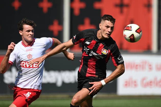 Patrik SCHICK (LEV) vs. Ahmet ARSLAN (RWE) Action, Tackle, Soccer 1st Bundesliga, Test Match, Test Match, Friendly Match, Bayer Leverkusen (LEV) vs. Rot-Weiss Essen on August 1, 2026, in Leverkusen, Germany. DFL regulations prohibit any use of photographs as image sequences and or quasi-video.