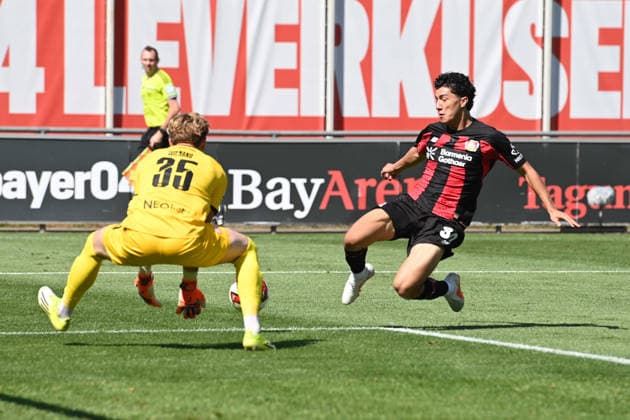 Ibrahim MAZA LEV vs. Goalkeeper Felix WIENAND RWE Action, Tackle, Soccer, Bundesliga 1, Friendly Match, Bayer Leverkusen (LEV) vs. Rot-Weiss Essen on August 1, 2026, in Leverkusen, Germany. DFL regulations prohibit any use of photographs as image sequences and or quasi-video.