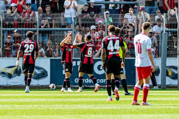 Friendly Match: Bayer 04 Leverkusen vs. Rot Weiss Essen, August 1, 2026, Ulrich Haberland Stadium, Leverkusen; Ben Hawighorst celebrates a goal for Bayer 04 Leverkusen (No. 29), Ezequiel Fernandez (Bayer 04 Leverkusen, 6), Jeanuel Belocian (Bayer 04 Leverkusen, 44), Friendly Match: Bayer 04 Leverkusen vs. Rot Weiss Essen, August 1, 2026, Ulrich Haberland Stadium, Leverkusen Copyright: xBEAUTIFULxSPORTS Erlhofx