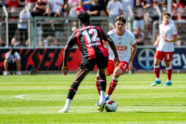 Friendly Match: Bayer 04 Leverkusen vs. Rot-Weiss Essen, August 1, 2026, Ulrich Haberland Stadium, Leverkusen; Edmond Tapsoba (Bayer 04 Leverkusen) 12, Jaka Äauber (Photo)nik Rot Weiss Essen 9, Friendly Match: Bayer 04 Leverkusen vs. Rot Weiss Essen, August 1, 2026, Ulrich Haberland Stadium, Leverkusen Copyright: xBEAUTIFULxSPORTS Erlhofx