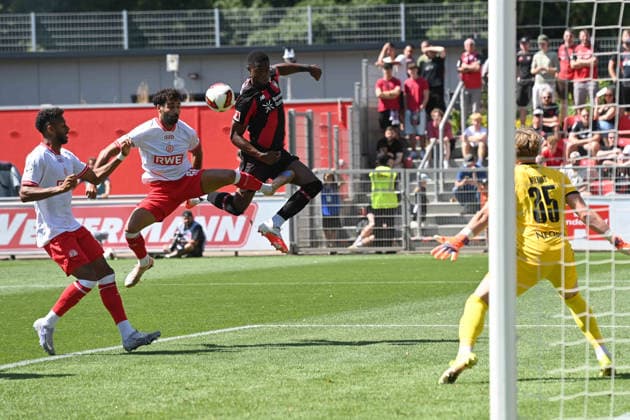 Christian KOFANE (LEV) vs. Ekin CELEBI (RWE) – header duel, action, tackle, against goalkeeper Felix WIENAND (RWE) – Soccer, 1. Bundesliga, Testspiel, testmatch, friendly match, Bayer Leverkusen (LEV) vs. Rot-Weiss Essen 3–0, on August 1, 2026, in Leverkusen, Germany. DFL regulations prohibit any use of photographs as image sequences and or quasi-video.