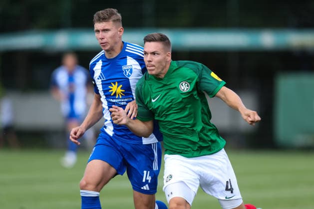 August 1, 2026, Soccer, Men s, Regionalliga Nord, Matchday 1, HSC Hannover vs. BSV Kickers Emden: Luc Ihorst (blue, 14) of BSV Kickers Emden battles for the ball with Fabian Weigel (4) of HSC Hannover