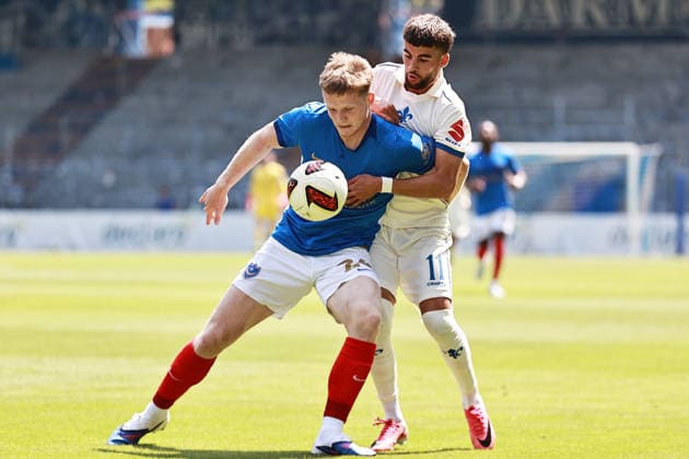 August 1, 2026, xtvx, Soccer Friendly Match, SV Darmstadt 98 vs. FC Portsmouth: Tackle, duel, compete—Ibrahim El Kadiri (SV Darmstadt 98) vs. Terry Devlin (FC Portsmouth). DFL and DFB regulations prohibit any use of photographs as image sequences and or quasi-video. Darmstadt