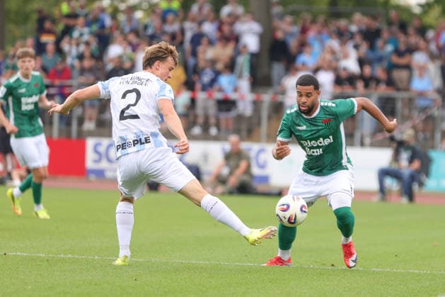 August 1, 2026, Men s, Soccer, 2026–2027 Season, Bavarian Regional League, Matchday 2: 1 FC Schweinfurt 1905 vs. TSV 1860 Munich. From left: Julian Bell (TSV 1860 Munich, No. 02) against Jason Prodanovic (FC Schweinfurt 05), 17 Schweinfurt Riedel Bau Arena at Sachs Stadio, Bavaria, Lower Franconia, Germany