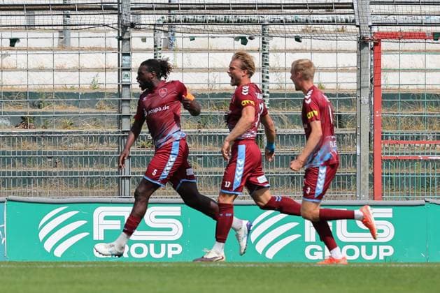 August 26, 2026, GER, Regionalliga Nord, Soccer, Matchday 1, 2026–2027 Season, Dietmar Scholze Stadium at the Lohmuehle, VfB Lübeck vs. SC Weiche Flensburg Goal celebration Cheering Goal scorer(s) Kevin Ntika SC Weiche Flensburg 08 05 celebrates the goal that tied the game at 1–1 Photo: nordphoto GmbH Tauchnitz Lübeck Dietmar Scholze Stadium an der Lohmuehle, SH, Germany Copyright: xnordphotoxGmbHx xTauchnitzx
