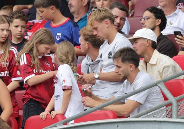 August 1, 2026 Soccer Season 2026–2027 Exhibition Match Friendly Match Preseason Match 1 FC Nuremberg Nuremberg FCN Club Real Oviedo Sports Photo Zink DaMa xdaxmax Tim Janisch 32, 1 FC Nuremberg FCN Adam Markhiev 6, 1 FC Nuremberg FCN are sitting in the stands according to their respective seats after receiving red cards and signing autographs