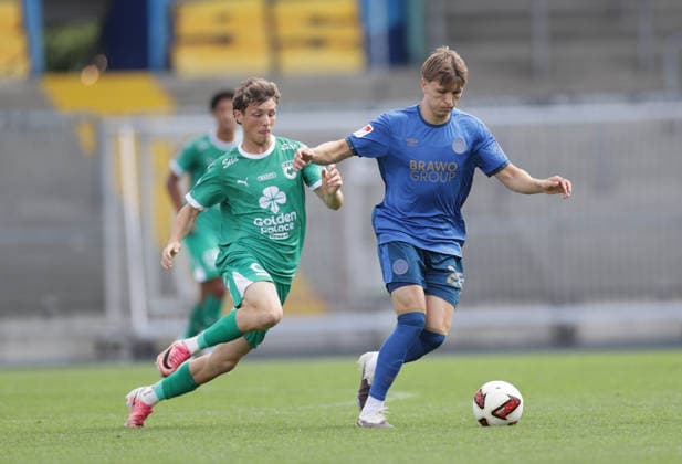 Tristan Wagner of Eintracht Braunschweig faces off against Quentin Benaets of La Louviere; Soccer, Men s, 2026–2027 Season, 2nd Division, Eintracht Stadium, Eintracht Braunschweig vs. RAAL La Louviere, preseason, friendly match, 0–0. DFL regulations prohibit any use of photographs as image sequences and or quasi-video.