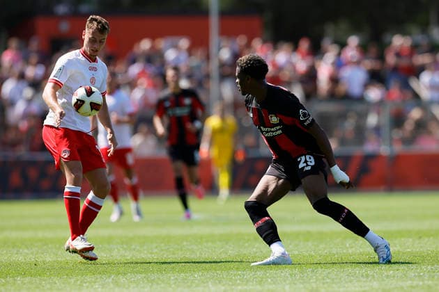 Soccer Friendly Match: Bayer 04 Leverkusen vs. Rot Weiss Essen on August 1, 2026, at Ulrich Haberland Stadium. Marvin Obuz (Rot Weiss Essen), Farid Alfa Ruprecht (Bayer 04 Leverkusen)